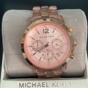 Michael Kors Watch in good condition & was welling taking care of; box included